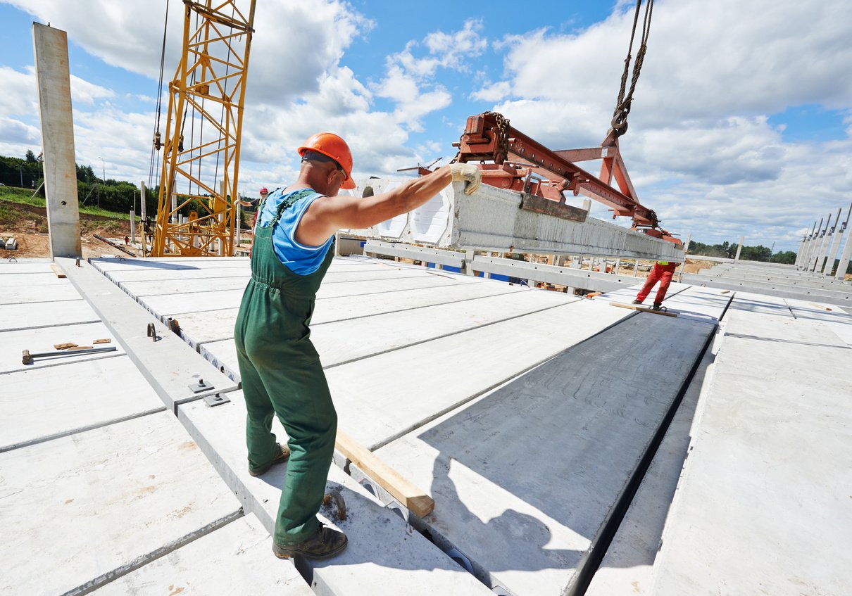 Builder Worker Installing Concrete Slab